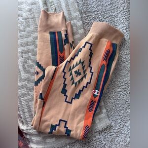 vintage-style Champion Reverse Weave Aztec Santa Fe tribal print sweatpants.
